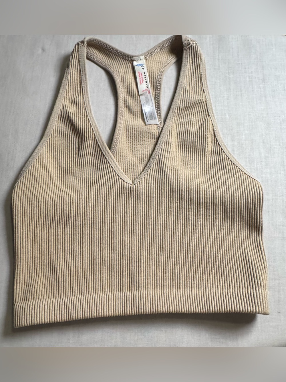 FP Movement by Free People Ribbed V-Neck Racerback Crop Top in Beige